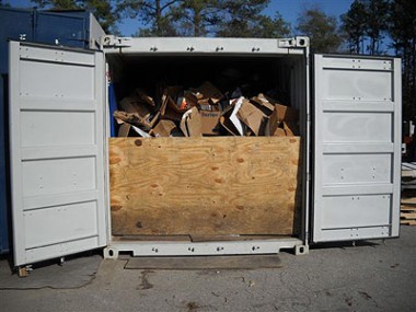 20' Sealand Filled with Waste to be Compacted